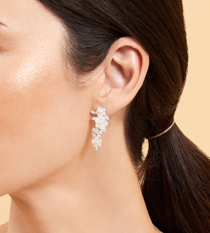 White Freshwater Pearl & Mother of Pearl Flower Magnolia Earrings - Model Image